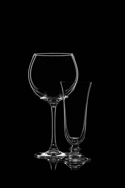 Glassware silhouettes on black. — Stock Photo, Image