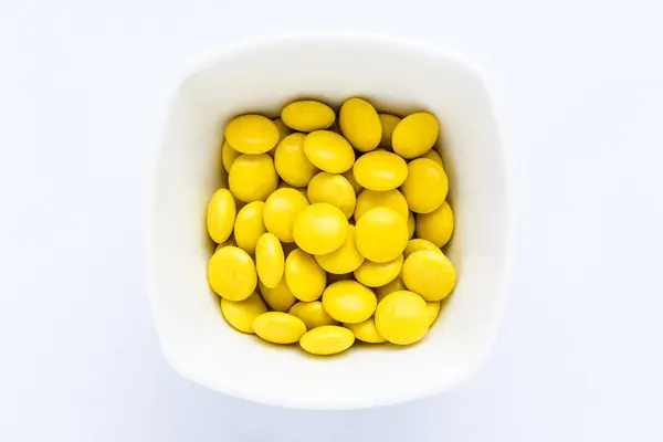 One Squared Small Bowl Small Yellow Sugar Coated Chocolate Candies — Stock Photo, Image