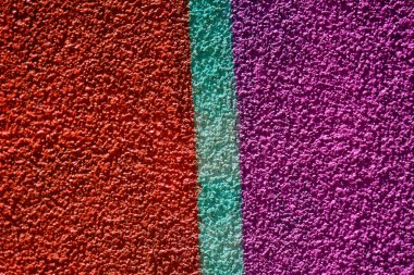 Rengi parlak kırmızı, pembe ve yeşil renklerle boyanmış duvar resimleri gibi minimalist desenli arka plan.