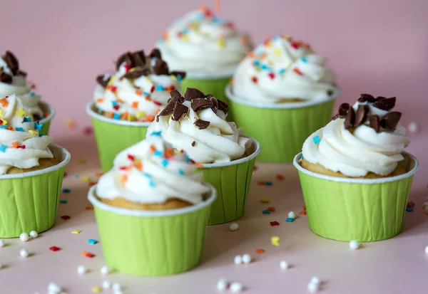 Tasty colorful cupcake on white background, food photo — Stock Photo, Image