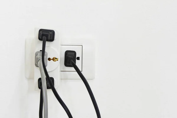 Electrical Plug Socket Overloaded White Background Copy Space Selective Focus — Stock Photo, Image