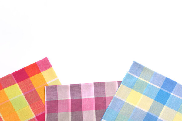 stack of folded handkerchiefs isolated on white background, copy space