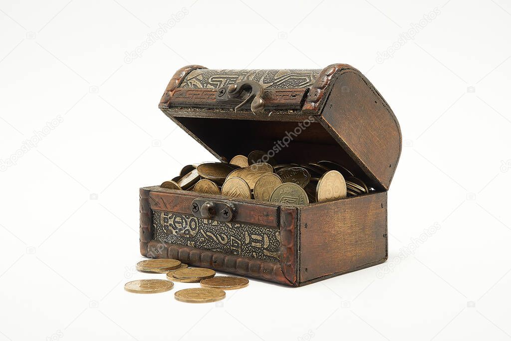 Chest with coins on a white background