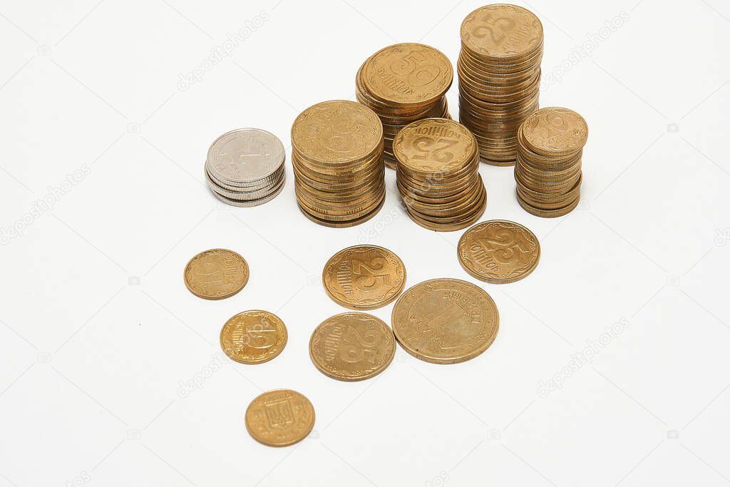 Stacks of coins on a white background.