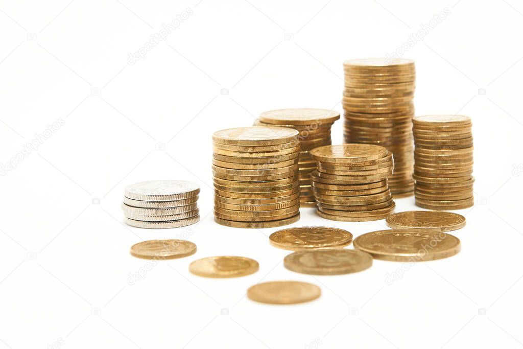 Stacks of coins on a white background.