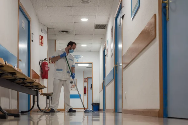 Cleaning staff cleaning hospital rooms