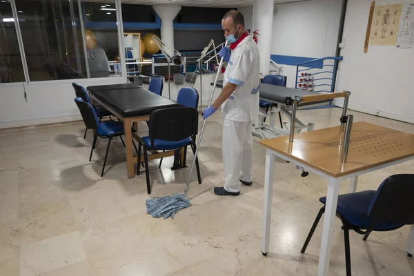 Cleaning staff cleaning hospital rooms