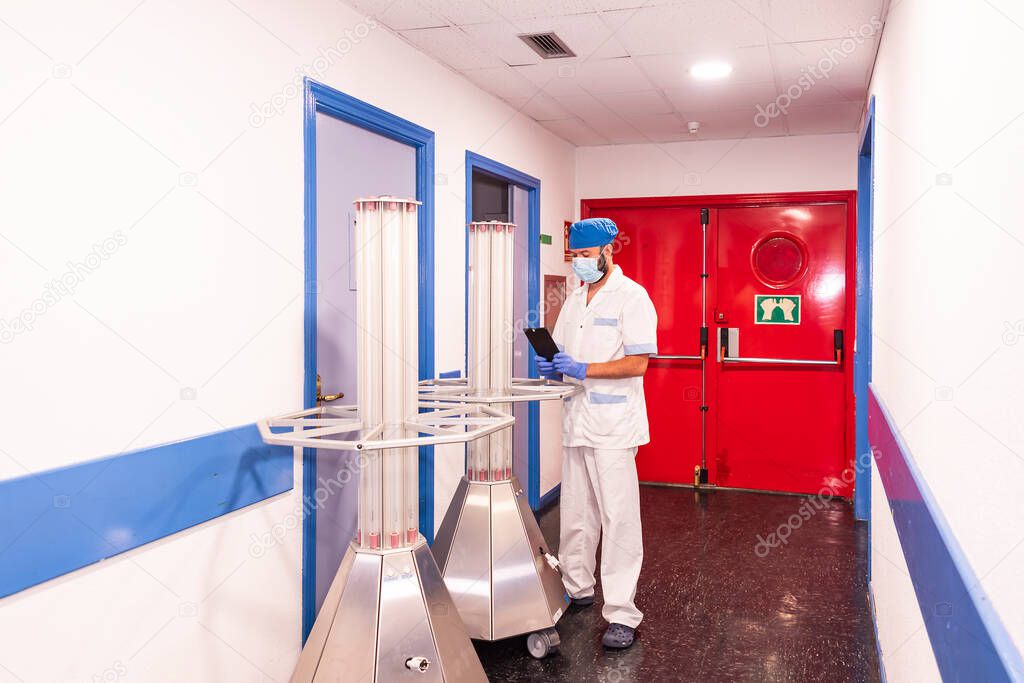 Conceptual photo of a hospital worker cleaning the ward