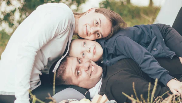 Family Tracksuits Lies Grass Tent — Stock Photo, Image