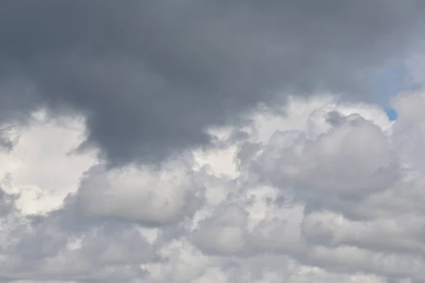 Cloudy sky, heavy gray clouds.