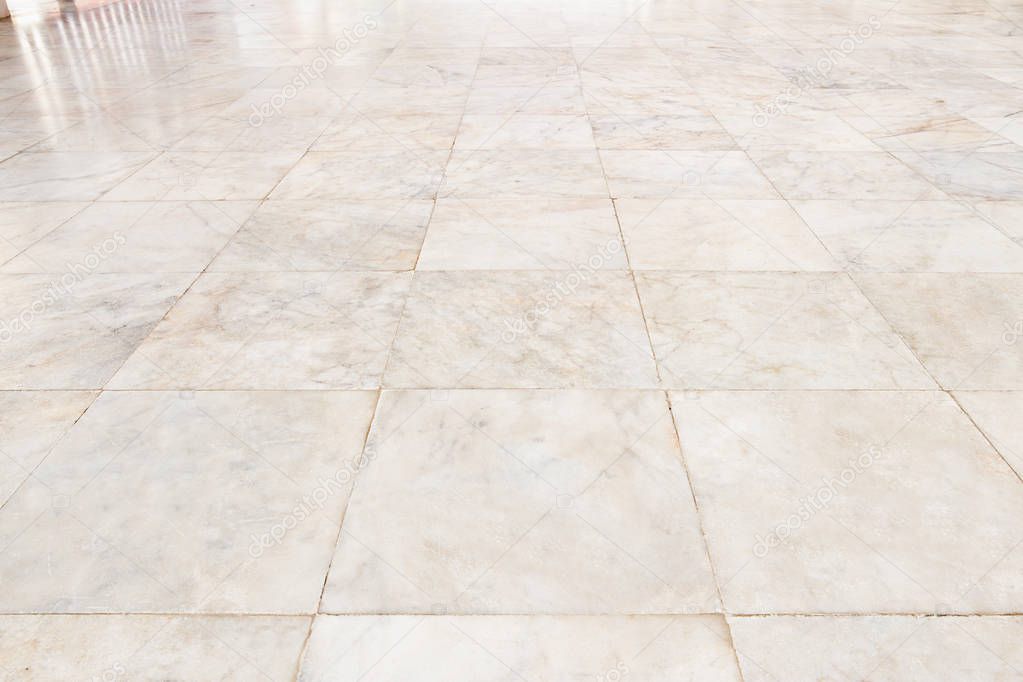 Real marble floor tile pattern for background, perspective view.