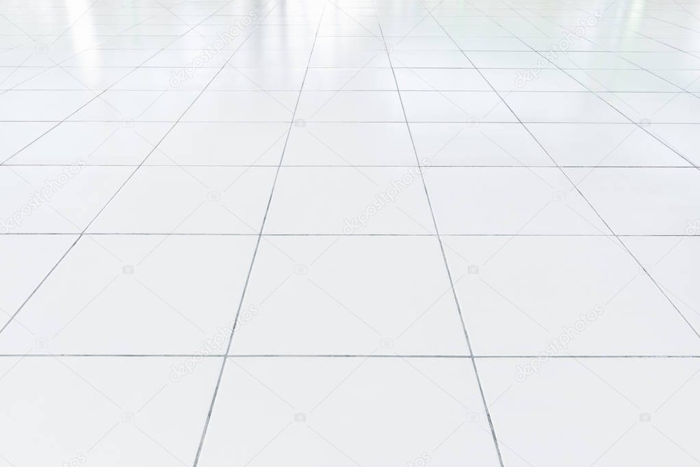 White tile floor clean condition with grid line for background.