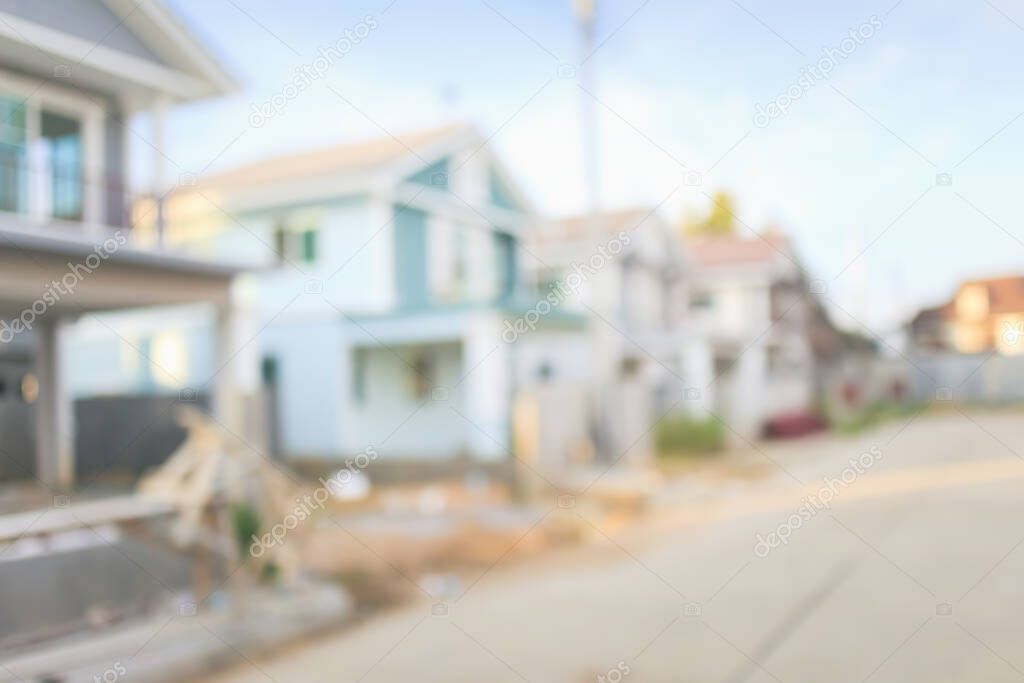 Housing subdivision or housing development blur background. Also call tract housing consist of house in large tract of land that divided into smaller. Business process by developer and builder.
