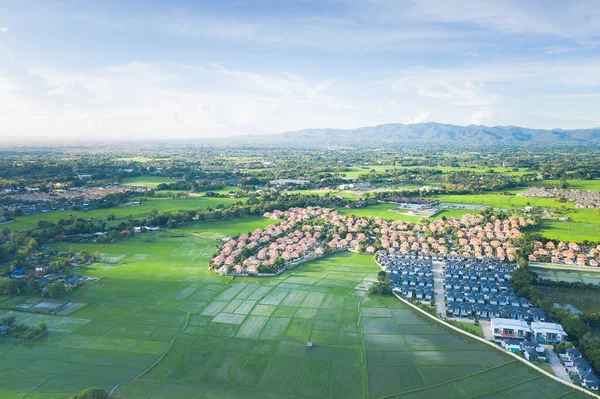 Housing subdivision or housing development. Also call tract housing. Large tract of land that divided into smaller. Business process by developer and builder. Aerial view in Chiang Mai of Thailand.