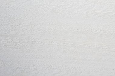 Ahşap doku kalın bir beyaz boya katmanıyla boyanır ve kuruduğunda deri gibi olur. Arkaplan