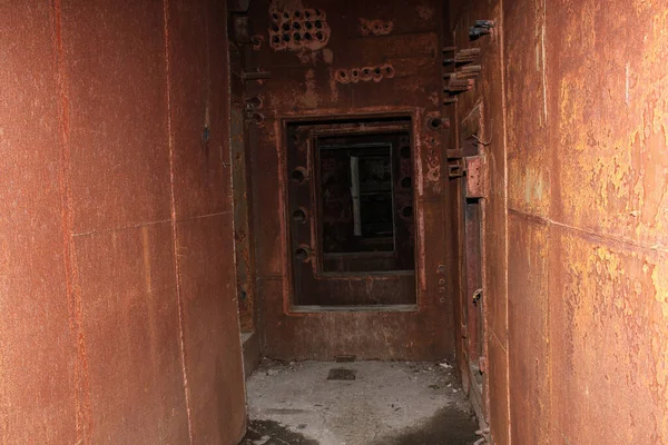 Dark underground corridors of an abandoned shelter. The largest secret facility of the USSR is the anti-nuclear bunker 1180. Moldova Oliscani, Soldanesti district.