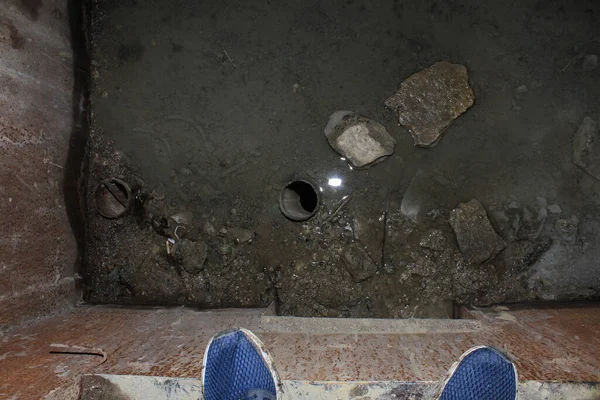 Dark underground corridors of an abandoned shelter. The largest secret facility of the USSR is the anti-nuclear bunker 1180. Moldova Oliscani, Soldanesti district.