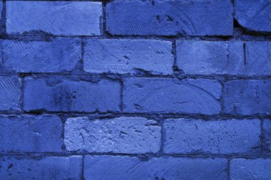 Renklerin mavi tonlarında eski grunge duvarının dokusu. Tasarım veya grafik kaynağında boşluk.