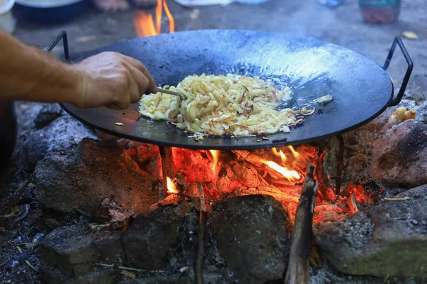 Abstract background on the theme of cooking in a camping or hiking setting. Selective focus with blurred background