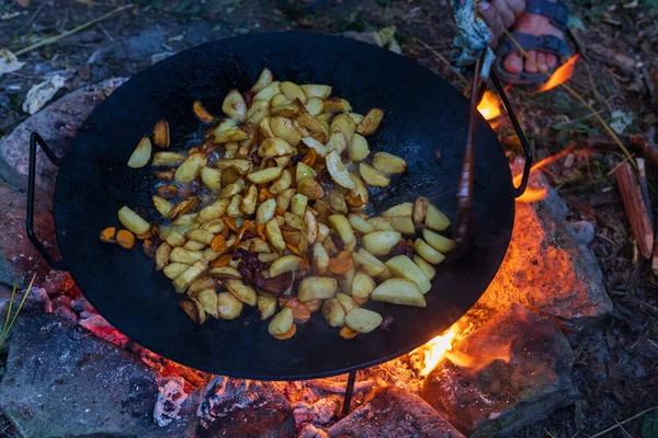 Abstract background on the theme of cooking in a camping or hiking setting. Selective focus with blurred background