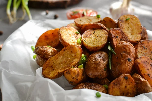 Rustic Potatoes Baked Potatoes Green Onions Herbs Plate Parchment Gray — Stock Photo, Image