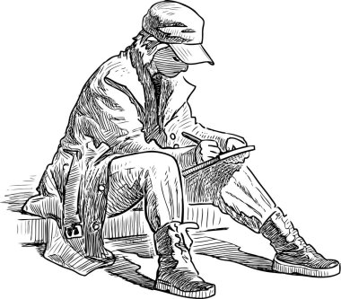 Bir gencin açık havada çizimi