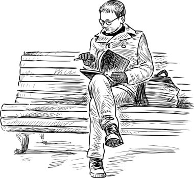 Genç kasaba adamı park bankına oturur ve kitap okur