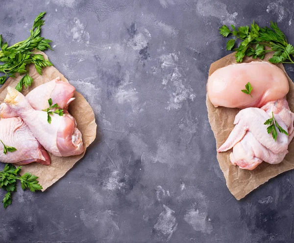 Raw chicken meat fillet, thigh, wings and legs