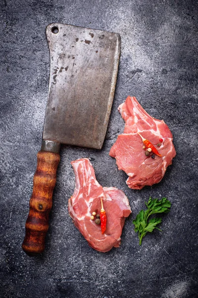 Raw meat and butchers knife