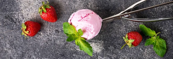 Ball of strawberry Ice cream in scoop — Stock Photo, Image