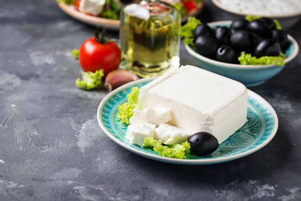 Fresh feta cheese with olives — Stock Photo, Image