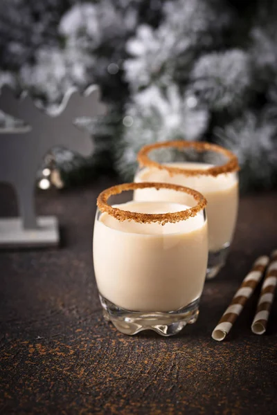 Traditional Christmas winter drink eggnog in glasses