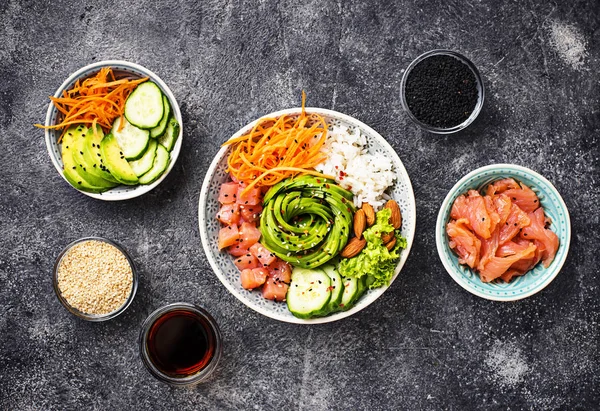 Hawaiian poke bowl with salmon, rice and vegetable — Stock Photo, Image