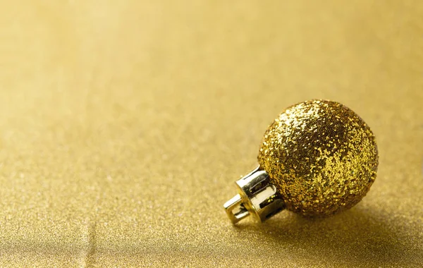 Golden glittering shining christmas ball