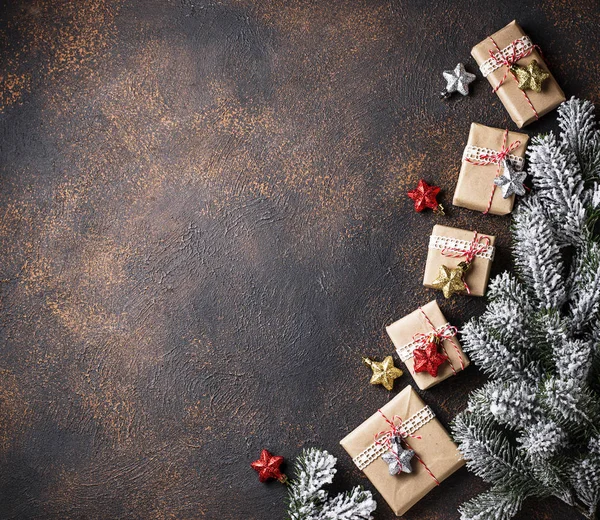 Christmas gift boxes in craft paper — Stock Photo, Image