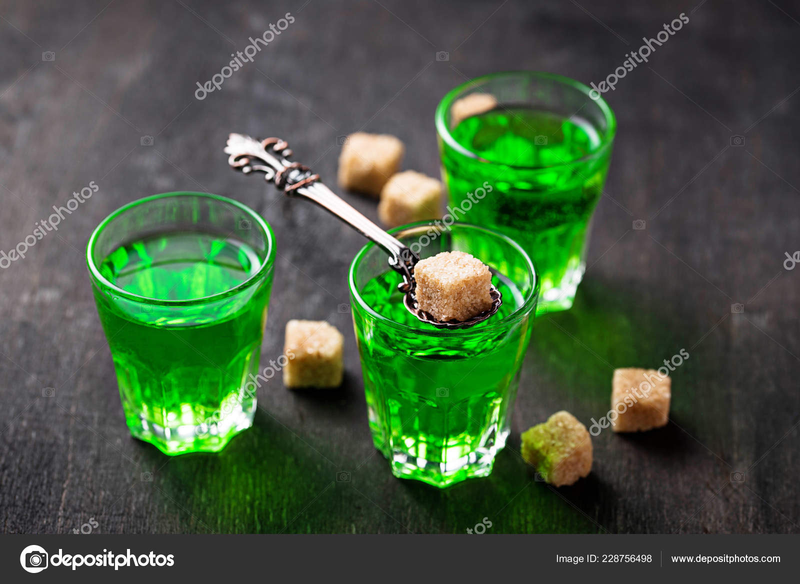 Glass with Green Absinthe. a Small Shot Glass with Green Liquid Stock Image  - Image of glass, drink: 124266747