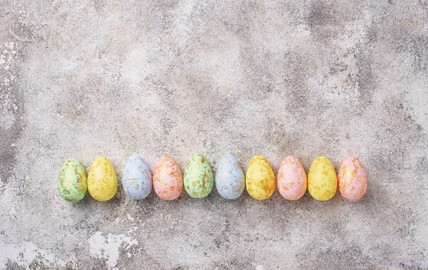 Velikonoční pozadí s dekorativní vejce — Stock fotografie