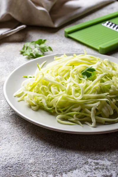 Raw green uncooked zucchini pasta — Stock Photo, Image