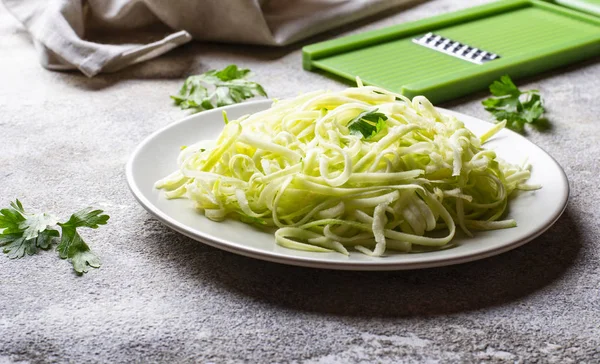 Raw green uncooked zucchini pasta — Stock Photo, Image