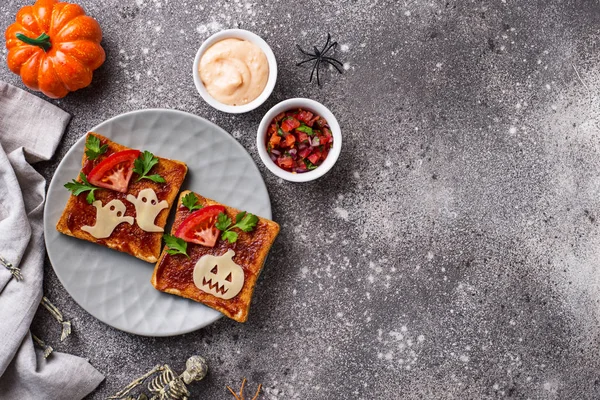 Halloween sandwiches toasts with ghost and pumpkin — Stock Photo, Image