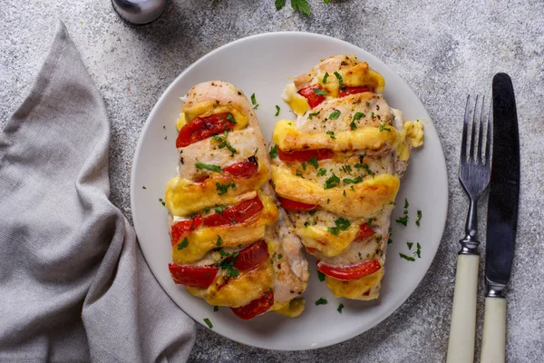 Baked chicken breasts with cheese and tomato — Stock Photo, Image