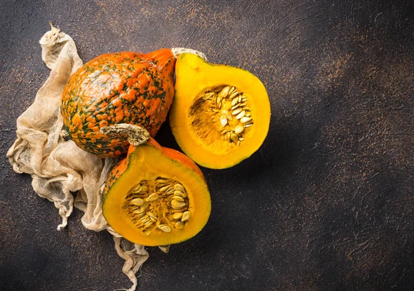 Dissected raw hokkaido pumpkin with seeds — Stock Photo, Image