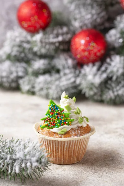 Christmas festive cupcake with cream — Stock Photo, Image