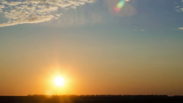 Time-lapse van zonsondergang over vlakke landschap — Stockvideo