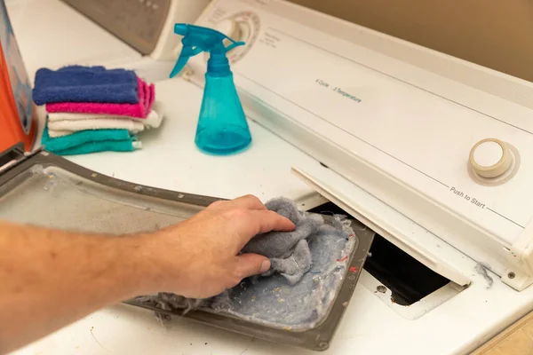 Hand Removing Dirty Lint Screen Dryer While Doing Laundry — Stock Photo, Image