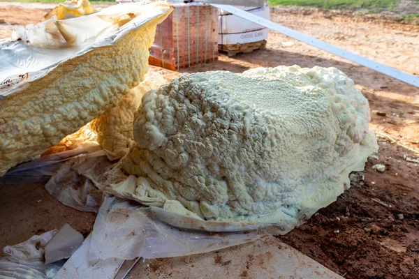 Leftover waste spray foam insulation during new home construction