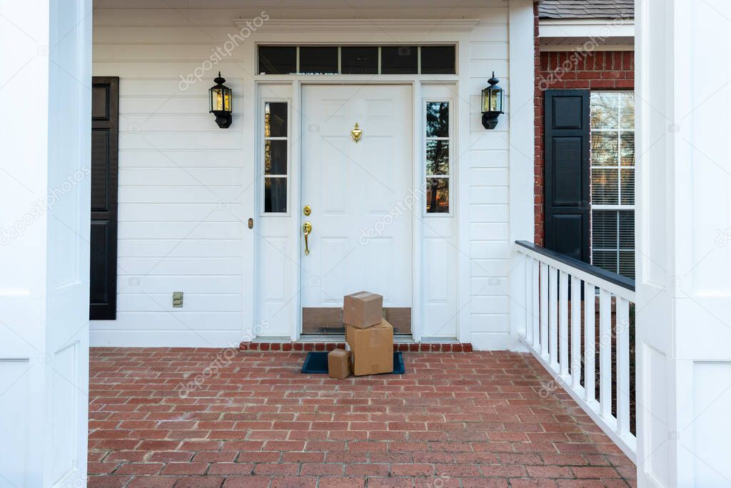 Packages on front porch of home