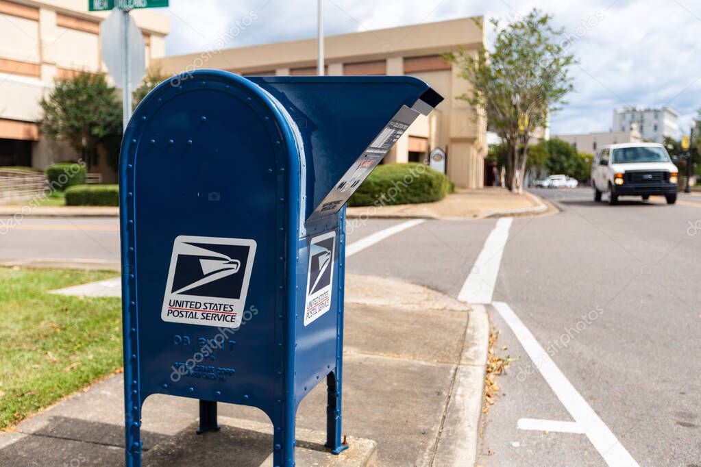 Hattiesburg, MS / USA - September 17, 2020: United States Postal Service collection box in downtown Hattiesburg, MS