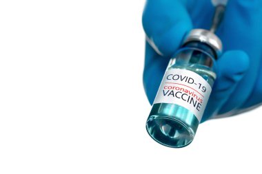 Coronavirus aşısı COVID-19 'un geliştirilmesi ve yaratılması. Coronavirus aşısı kavramı doktor mavi aşı kavanozunun elinde. Aşı Coronavirus 'a karşı savaş kavramı.