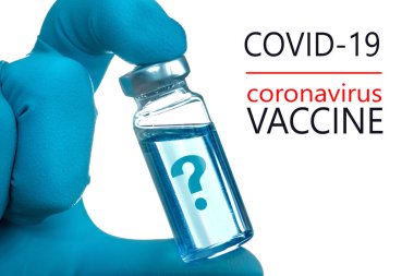 Coronavirus aşısı COVID-19 'un geliştirilmesi ve yaratılması. Coronavirus aşısı kavramı doktor mavi aşı kavanozunun elinde. Aşı Coronavirus 'a karşı savaş kavramı.